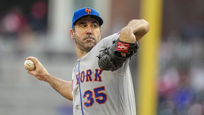 Jun 8, 2023; Cumberland, Georgia, USA; New York Mets starting pitcher Justin Verlander (35)  pitches against the Atlanta Braves during the first inning at Truist Park. Mandatory Credit: Dale Zanine-USA TODAY Sports