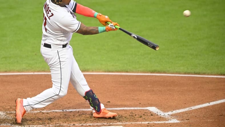 Jun 8, 2023; Cleveland, Ohio, USA; Cleveland Guardians third baseman Jose Ramirez (11) hits a two-run home run in the third inning against the Boston Red Sox at Progressive Field. Mandatory Credit: David Richard-USA TODAY Sports