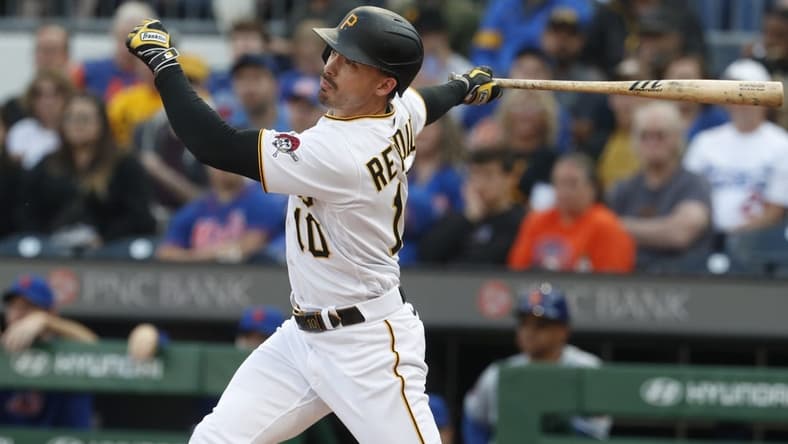 Jun 9, 2023; Pittsburgh, Pennsylvania, USA; Pittsburgh Pirates left fielder Bryan Reynolds (10) hits a single against the New York Mets during the first inning at PNC Park. Mandatory Credit: Charles LeClaire-USA TODAY Sports
