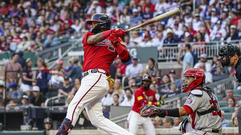 Jun 9, 2023; Cumberland, Georgia, USA; Atlanta Braves shortstop Orlando Arcia (11) grounds out to drive in a run against the Washington Nationals during the second inning at Truist Park. Mandatory Credit: Dale Zanine-USA TODAY Sports