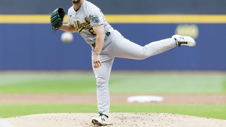 Jun 9, 2023; Milwaukee, Wisconsin, USA; Oakland Athletics pitcher Sam Moll (60) throws a pitch during the first inning against the Milwaukee Brewers at American Family Field. Mandatory Credit: Jeff Hanisch-USA TODAY Sports