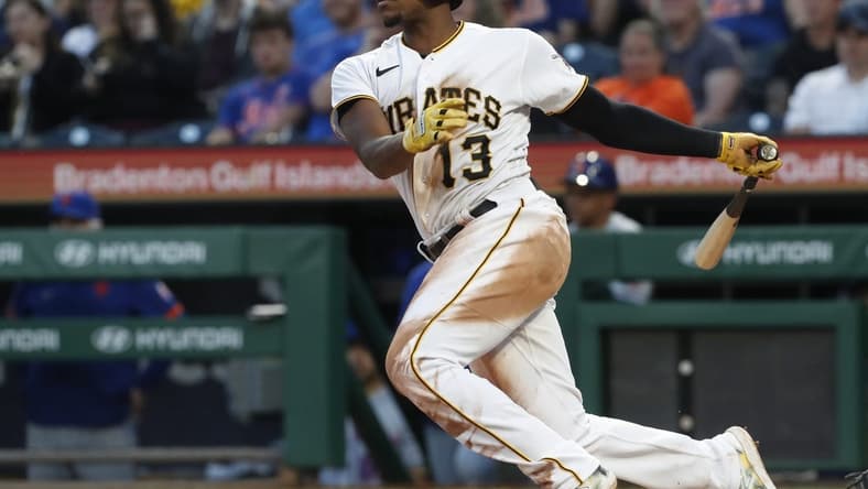 Jun 9, 2023; Pittsburgh, Pennsylvania, USA; Pittsburgh Pirates third baseman Ke'Bryan Hayes (13) hits a two run double against the New York Mets during the fourth inning at PNC Park. Mandatory Credit: Charles LeClaire-USA TODAY Sports