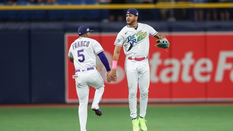 Jun 9, 2023; St. Petersburg, Florida, USA; Tampa Bay Rays shortstop Wander Franco (5) and center fielder Jose Siri (22) celebrate after beating the Texas Rangers at Tropicana Field. Mandatory Credit: Nathan Ray Seebeck-USA TODAY Sports