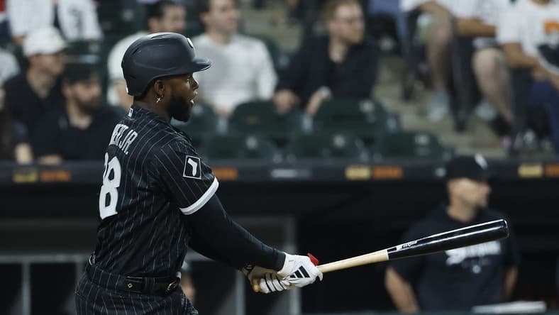 Jun 9, 2023; Chicago, Illinois, USA; Chicago White Sox center fielder Luis Robert Jr. (88) hits a walk-off single against the Miami Marlins during the ninth inning at Guaranteed Rate Field. Mandatory Credit: Kamil Krzaczynski-USA TODAY Sports