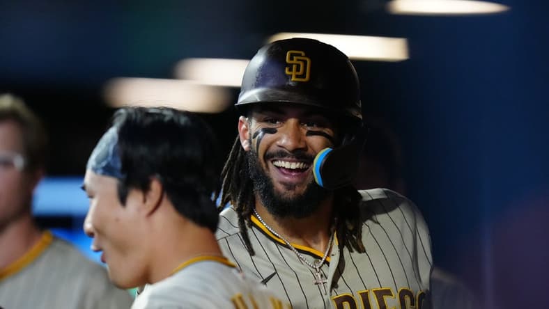 Jun 9, 2023; Denver, Colorado, USA; San Diego Padres right fielder Fernando Tatis Jr. (23) celebrates his solo home run in the sixth inning against the Colorado Rockies at Coors Field. Mandatory Credit: Ron Chenoy-USA TODAY Sports
