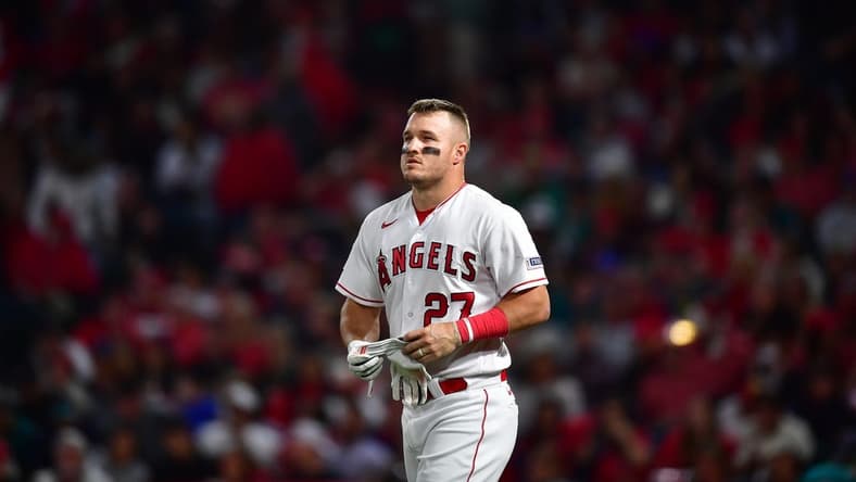 Jun 9, 2023; Anaheim, California, USA; Los Angeles Angels center fielder Mike Trout (27) reacts after striking out to end the seventh inning agianst the Seattle Mariners at Angel Stadium. Mandatory Credit: Gary A. Vasquez-USA TODAY Sports