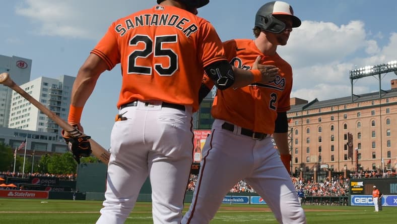 Jun 10, 2023; Baltimore, Maryland, USA; Baltimore Orioles third baseman Gunnar Henderson (2) celebrates withright fielder Anthony Santander (25) after hitting a second inning home run against the Kansas City Royals at Oriole Park at Camden Yards. Mandatory Credit: Tommy Gilligan-USA TODAY Sports