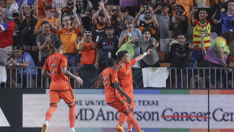 Jun 10, 2023; Houston, Texas, USA; Houston Dynamo FC midfielder Amine Bassi (8) celebrates after scoring a goal during the second half against the Los Angeles FC at Shell Energy Stadium. Mandatory Credit: Troy Taormina-USA TODAY Sports