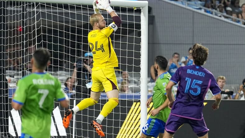 Jun 10, 2023; Charlotte, North Carolina, USA; Seattle Sounders goalkeeper Stefan Frei (24) leaps for the save during the second half against the Charlotte FC at Bank of America Stadium. Mandatory Credit: Jim Dedmon-USA TODAY Sports