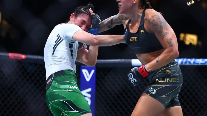 Jun 10, 2023; Vancouver, BC, Canada; Amanda Nunes lands a hit against Irene Aldana during UFC 289 at Rogers Arena. Mandatory Credit: Sergei Belski-USA TODAY Sports