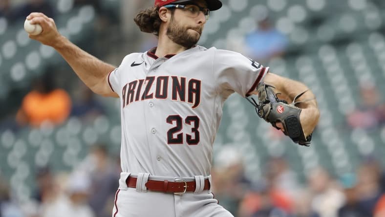 Jun 11, 2023; Detroit, Michigan, USA; Arizona Diamondbacks starting pitcher Zac Gallen (23) pitches in the first inning against the Detroit Tigers at Comerica Park. Mandatory Credit: Rick Osentoski-USA TODAY Sports