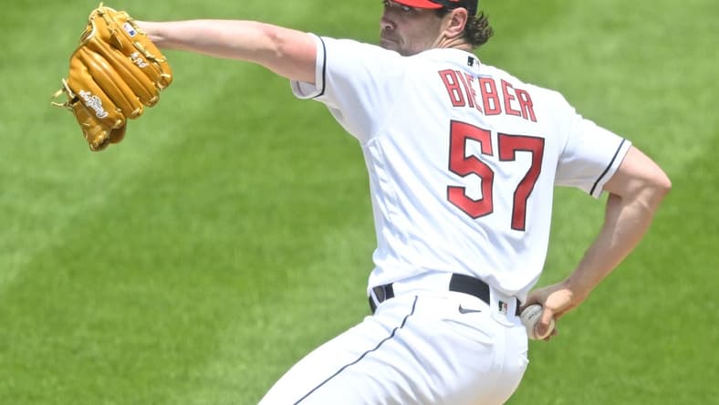 Jun 11, 2023; Cleveland, Ohio, USA; Cleveland Guardians starting pitcher Shane Bieber (57) delivers a pitch in the third inning against the Houston Astros at Progressive Field. Mandatory Credit: David Richard-USA TODAY Sports
