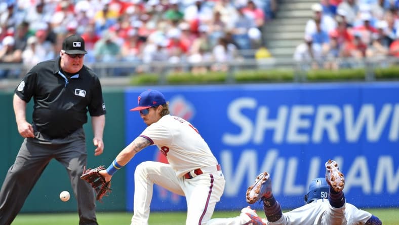Jun 11, 2023; Philadelphia, Pennsylvania, USA; Los Angeles Dodgers right fielder Mookie Betts (50) steals second base ahead of tag by Philadelphia Phillies second baseman Bryson Stott (5) during the second inning at Citizens Bank Park. Mandatory Credit: Eric Hartline-USA TODAY Sports