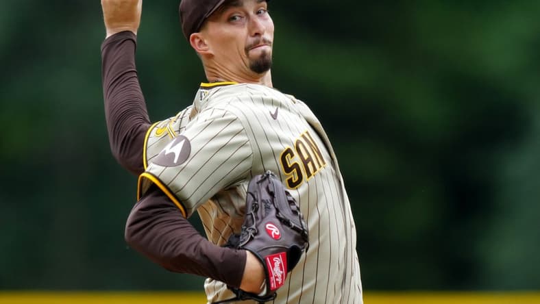 Jun 11, 2023; Denver, Colorado, USA; San Diego Padres starting pitcher Blake Snell (4) delivers a pitch in the first inning against the Colorado Rockies at Coors Field. Mandatory Credit: Ron Chenoy-USA TODAY Sports