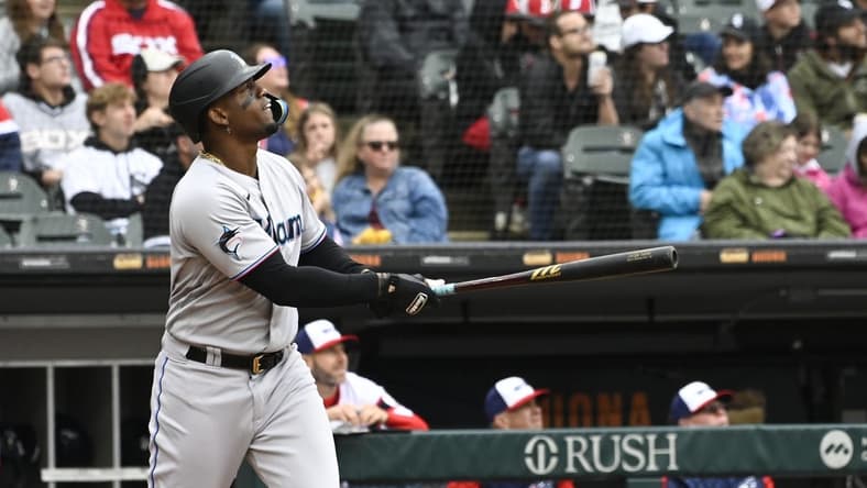 Jun 11, 2023; Chicago, Illinois, USA; Miami Marlins designated hitter Jorge Soler (12) hits a home run against the Chicago White Sox during the fifth inning at Guaranteed Rate Field. Mandatory Credit: Matt Marton-USA TODAY Sports