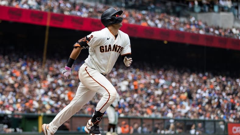 Jun 11, 2023; San Francisco, California, USA; San Francisco Giants catcher Blake Sabol (2) hits an RBI single against the Chicago Cubs during the fourth inning at Oracle Park. Mandatory Credit: John Hefti-USA TODAY Sports