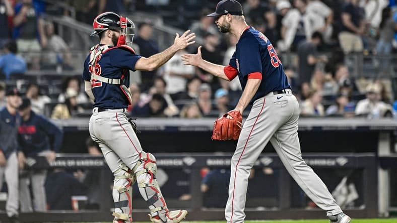 Jun 11, 2023; Bronx, New York, USA; Boston Red Sox catcher Connor Wong (12) and relief pitcher Chris Martin (55) react after defeating the New York Yankees at Yankee Stadium. Mandatory Credit: John Jones-USA TODAY Sports