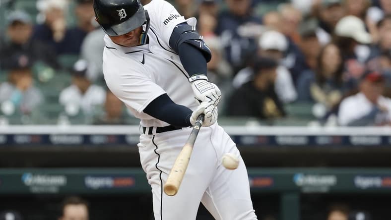 Jun 12, 2023; Detroit, Michigan, USA; Detroit Tigers first baseman Spencer Torkelson (20) hits a single in the first inning against the Atlanta Braves at Comerica Park. Mandatory Credit: Rick Osentoski-USA TODAY Sports
