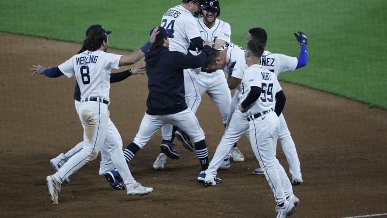 Jun 12, 2023; Detroit, Michigan, USA; Detroit Tigers first baseman Spencer Torkelson (20) celebrates with teammates after he hits an RBI walk off single tenth inning against the Atlanta Braves at Comerica Park. Mandatory Credit: Rick Osentoski-USA TODAY Sports