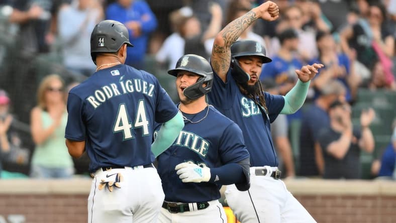 Jun 12, 2023; Seattle, Washington, USA; Seattle Mariners center fielder Julio Rodriguez (44) and first baseman Ty France (23) and shortstop J.P. Crawford (3) celebrate after France hit a three-run home run against the Miami Marlins during the second inning at T-Mobile Park. Mandatory Credit: Steven Bisig-USA TODAY Sports