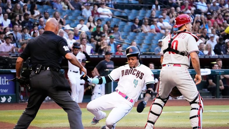 Jun 12, 2023; Phoenix, AZ, USA; Arizona Diamondbacks Ketel Marte (4) scores on an RBI-single by Christian Walker against the Philadelphia Phillies in the first inning at Chase Field. Mandatory Credit: Rob Schumacher-Arizona Republic