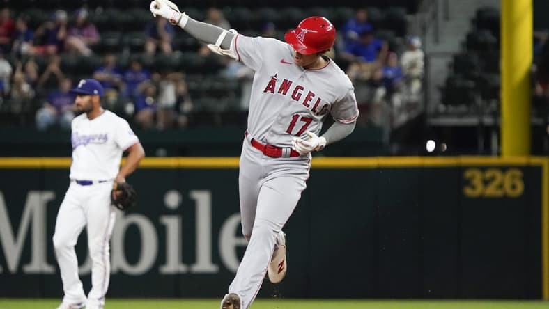 Jun 12, 2023; Arlington, Texas, USA; Los Angeles Angels designated hitter Shohei Ohtani (17) reacts as he rounds the bases after hitting a two run go ahead home run during the twelfth inning against the Texas Rangers at Globe Life Field. Mandatory Credit: Raymond Carlin III-USA TODAY Sports