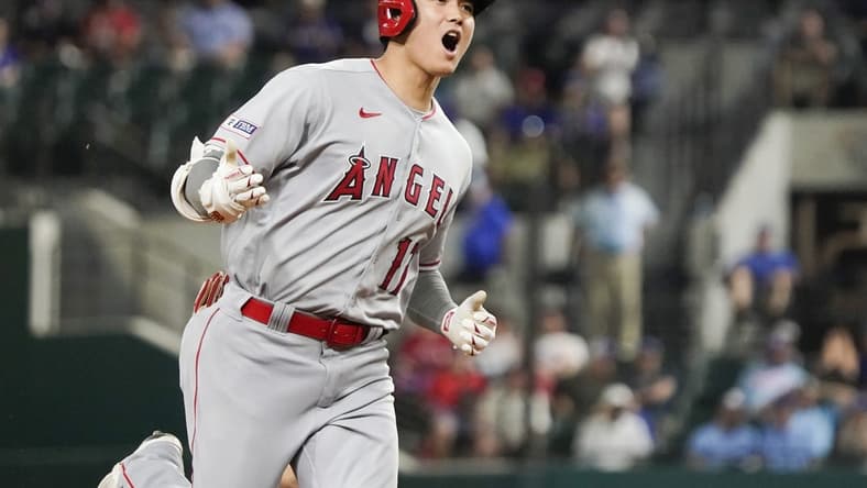 Jun 12, 2023; Arlington, Texas, USA; Los Angeles Angels designated hitter Shohei Ohtani (17) reacts as he rounds the bases after hitting a two run go ahead home run during the twelfth inning against the Texas Rangers at Globe Life Field. Mandatory Credit: Raymond Carlin III-USA TODAY Sports