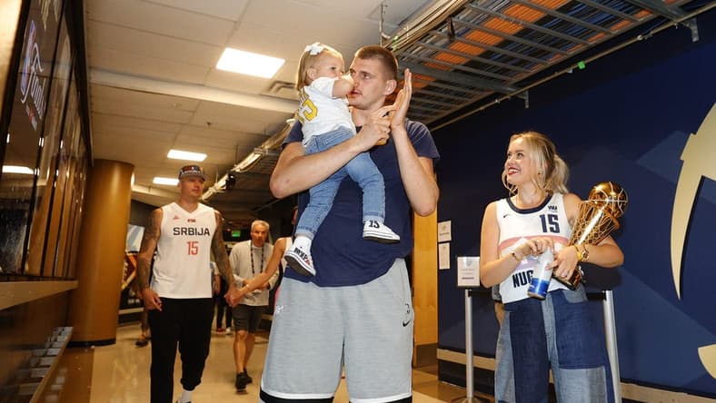 Jun 12, 2023; Denver, Colorado, USA; Denver Nuggets center Nikola Jokic (15) celebrates with his family after the Nuggets won the NBA championship by defeating the Miami Heat in game five of the 2023 NBA Finals at Ball Arena. Mandatory Credit: Isaiah J. Downing-USA TODAY Sports