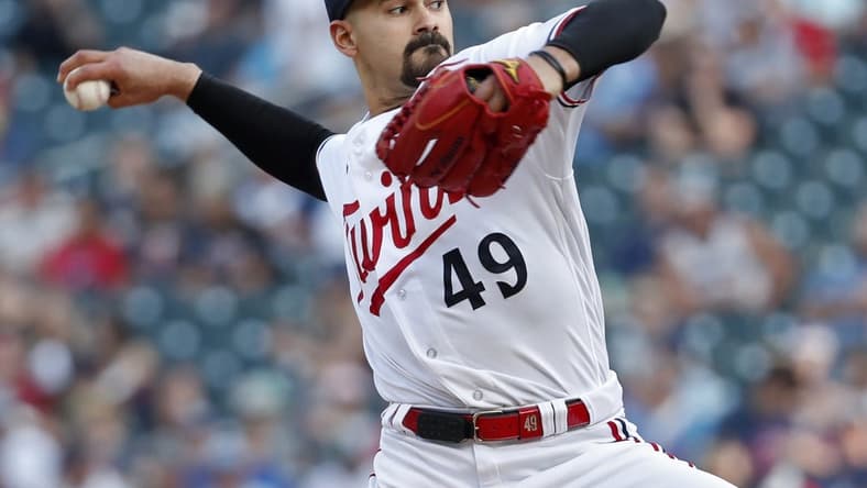 Jun 13, 2023; Minneapolis, Minnesota, USA; Minnesota Twins starting pitcher Pablo Lopez (49) throws to the Milwaukee Brewers in the first inning at Target Field. Mandatory Credit: Bruce Kluckhohn-USA TODAY Sports