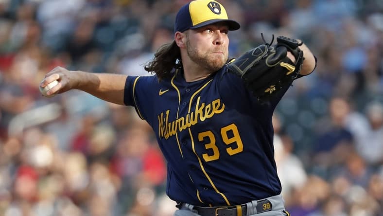 Jun 13, 2023; Minneapolis, Minnesota, USA; Milwaukee Brewers starting pitcher Corbin Burnes (39) throws to the Minnesota Twins in the first inning at Target Field. Mandatory Credit: Bruce Kluckhohn-USA TODAY Sports