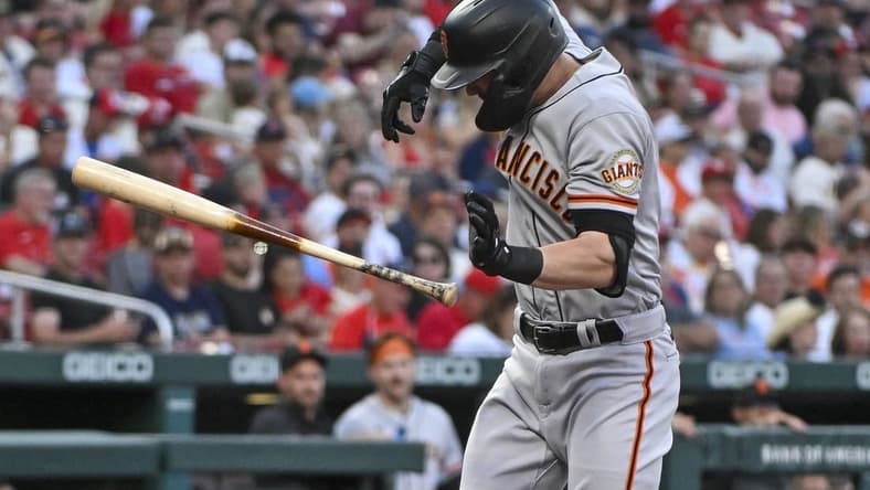 Jun 13, 2023; St. Louis, Missouri, USA; San Francisco Giants left fielder Mitch Haniger (17) reacts after he was hit by a pitch from St. Louis Cardinals starting pitcher Jack Flaherty (not pictured) during the third inning at Busch Stadium. Mandatory Credit: Jeff Curry-USA TODAY Sports