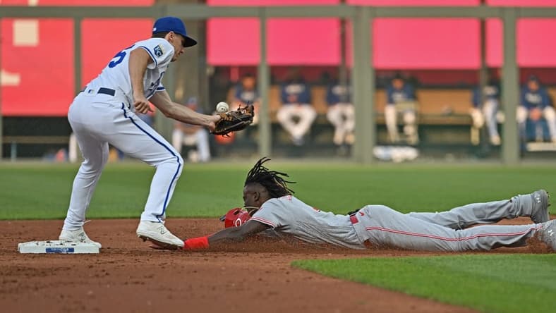 Jun 13, 2023; Kansas City, Missouri, USA; Cincinnati Reds shortstop Elly De La Cruz (44) steals second base against Kansas City Royals second baseman Matt Duffy (15) in the first inning at Kauffman Stadium. Mandatory Credit: Peter Aiken-USA TODAY Sports
