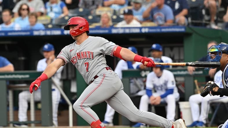 Jun 13, 2023; Kansas City, Missouri, USA; Cincinnati Reds first baseman Spencer Steer (7) hits an RBI single in the first inning against Kansas City Royals at Kauffman Stadium. Mandatory Credit: Peter Aiken-USA TODAY Sports