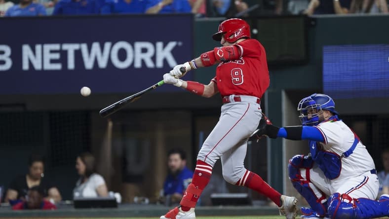 Jun 13, 2023; Arlington, Texas, USA;  Los Angeles Angels shortstop Zach Neto (9) hits a two-run home run during the ninth inning against the Texas Rangers at Globe Life Field. Mandatory Credit: Kevin Jairaj-USA TODAY Sports