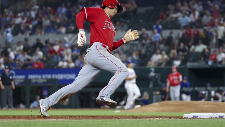 Jun 13, 2023; Arlington, Texas, USA; Los Angeles Angels designated hitter Shohei Ohtani (17) rounds third base and scores during the ninth inning against the Texas Rangers at Globe Life Field. Mandatory Credit: Kevin Jairaj-USA TODAY Sports