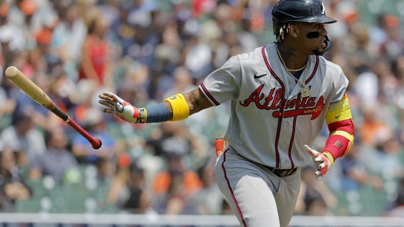 Jun 14, 2023; Detroit, Michigan, USA; Atlanta Braves right fielder Ronald Acuna Jr. (13) hits a two run home run in the third inning against the Detroit Tigers at Comerica Park. Mandatory Credit: Rick Osentoski-USA TODAY Sports