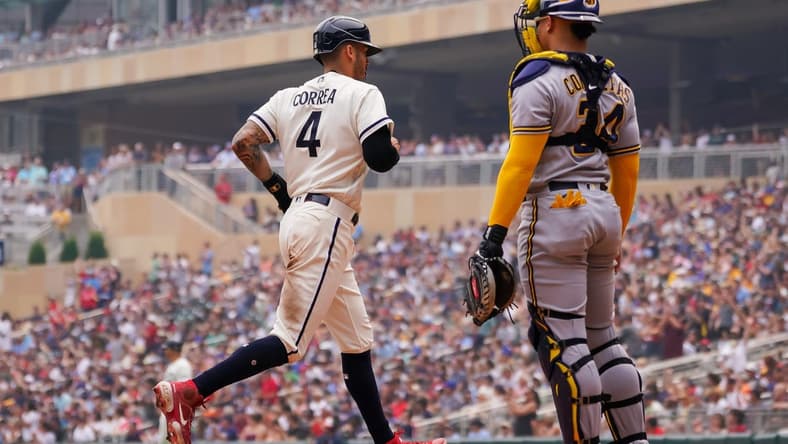 Jun 14, 2023; Minneapolis, Minnesota, USA; Minnesota Twins shortstop Carlos Correa (4) scores against the Milwaukee Brewers in the third inning at Target Field. Mandatory Credit: Brad Rempel-USA TODAY Sports