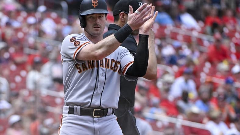 Jun 14, 2023; St. Louis, Missouri, USA; San Francisco Giants center fielder Mike Yastrzemski (5) reacts after scoring the game winning run against the St. Louis Cardinals during the tenth inning at Busch Stadium. Mandatory Credit: Jeff Curry-USA TODAY Sports