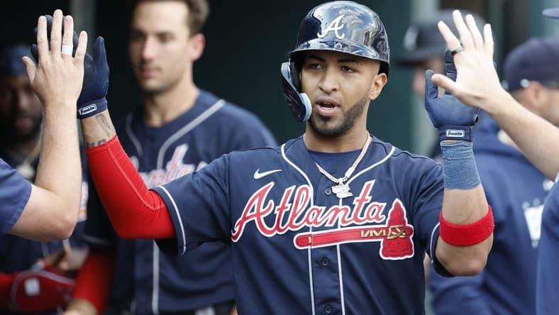Jun 14, 2023; Detroit, Michigan, USA; Atlanta Braves left fielder Eddie Rosario (8) celebrates with teammates after hitting a home run against the Detroit Tigers in the sixth inning at Comerica Park. Mandatory Credit: Rick Osentoski-USA TODAY Sports