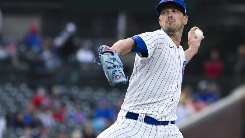 Jun 14, 2023; Chicago, Illinois, USA; Chicago Cubs starting pitcher Drew Smyly (11) delivers against the Pittsburgh Pirates during the first inning at Wrigley Field. Mandatory Credit: Matt Marton-USA TODAY Sports