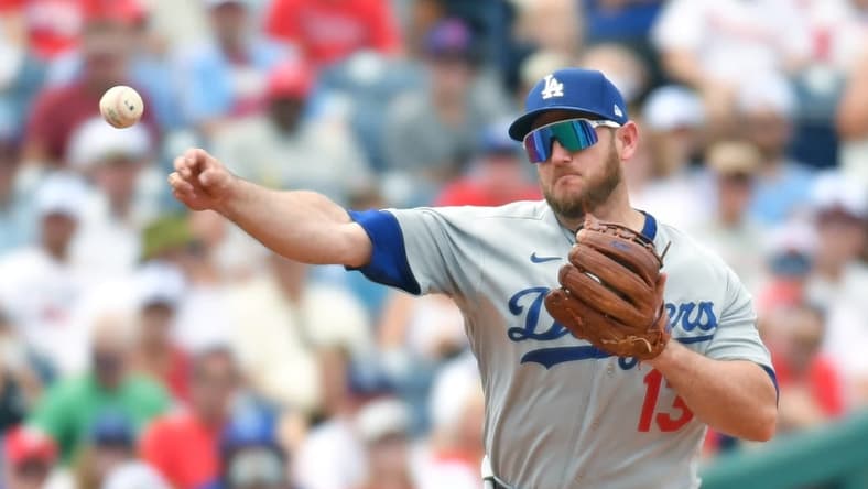 Jun 11, 2023; Philadelphia, Pennsylvania, USA; Los Angeles Dodgers third baseman Max Muncy (13) throws to first base against the Philadelphia Phillies at Citizens Bank Park. Mandatory Credit: Eric Hartline-USA TODAY Sports