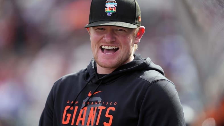 Jun 10, 2023; San Francisco, California, USA; San Francisco Giants starting pitcher Logan Webb (62) stands in the dugout during the first inning against the Chicago Cubs at Oracle Park. Mandatory Credit: Darren Yamashita-USA TODAY Sports