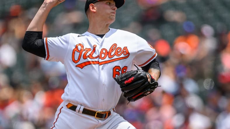 Jun 15, 2023; Baltimore, Maryland, USA; Baltimore Orioles starting pitcher Tyler Wells (68) throws a pitch during the first inning against the Toronto Blue Jays at Oriole Park at Camden Yards. Mandatory Credit: Reggie Hildred-USA TODAY Sports