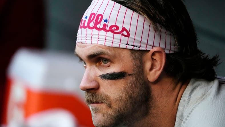 Philadelphia Phillies designated hitter Bryce Harper (3) reacts after grounding out against the Arizona Diamondbacks in the first inning at Chase Field in Phoenix on June 12, 2023.