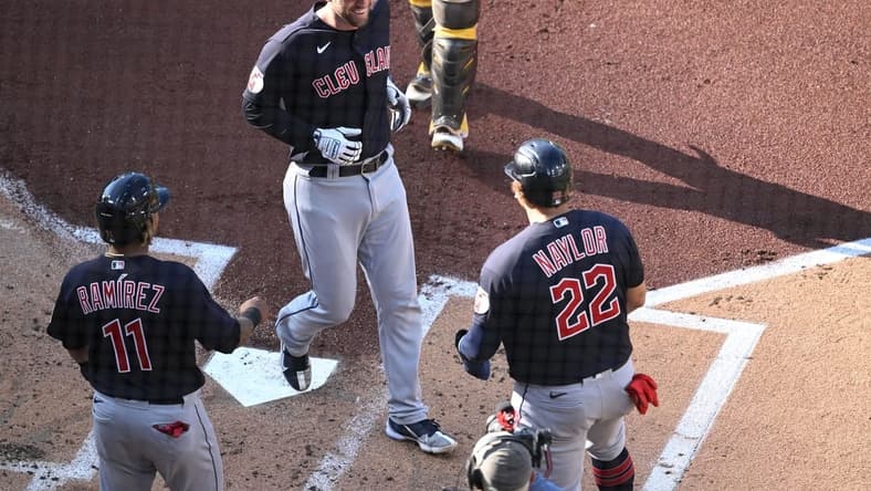 Jun 15, 2023; San Diego, California, USA; Cleveland Guardians catcher David Fry (12) is greeted at home plate after hitting a three-run home run against the San Diego Padres during the first inning at Petco Park. Mandatory Credit: Orlando Ramirez-USA TODAY Sports