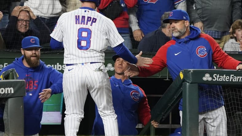 Jun 15, 2023; Chicago, Illinois, USA; Chicago Cubs left fielder Ian Happ (8) celebrates with manager David Ross (3) after scoring against the Pittsburgh Pirates during the fifth inning at Wrigley Field. Mandatory Credit: David Banks-USA TODAY Sports