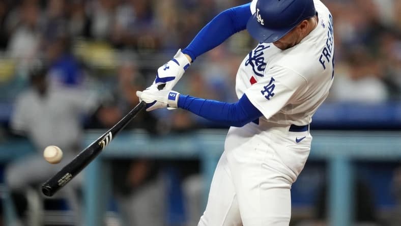 Jun 15, 2023; Los Angeles, California, USA; Los Angeles Dodgers first baseman Freddie Freeman (5) bats in the third inning against the Chicago White Sox  at Dodger Stadium. Mandatory Credit: Kirby Lee-USA TODAY Sports