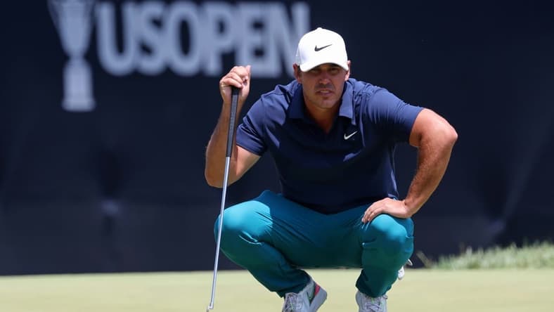 Jun 16, 2023; Los Angeles, California, USA; Brooks Koepka (LIV player) lines up a putt on the on the ninth green during the second round of the U.S. Open golf tournament. Mandatory Credit: Kiyoshi Mio-USA TODAY Sports