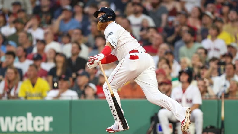Jun 16, 2023; Boston, Massachusetts, USA; Boston Red Sox designated hitter Justin Turner (2) hits a two run home run during the second inning against the New York Yankees at Fenway Park. Mandatory Credit: Paul Rutherford-USA TODAY Sports