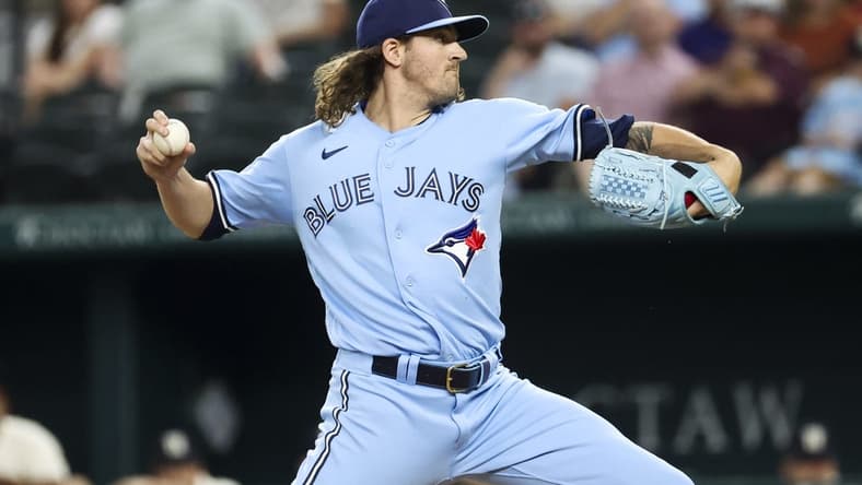 Jun 16, 2023; Arlington, Texas, USA; Toronto Blue Jays starting pitcher Kevin Gausman (34) throws during the first inning against the Texas Rangers at Globe Life Field. Mandatory Credit: Kevin Jairaj-USA TODAY Sports